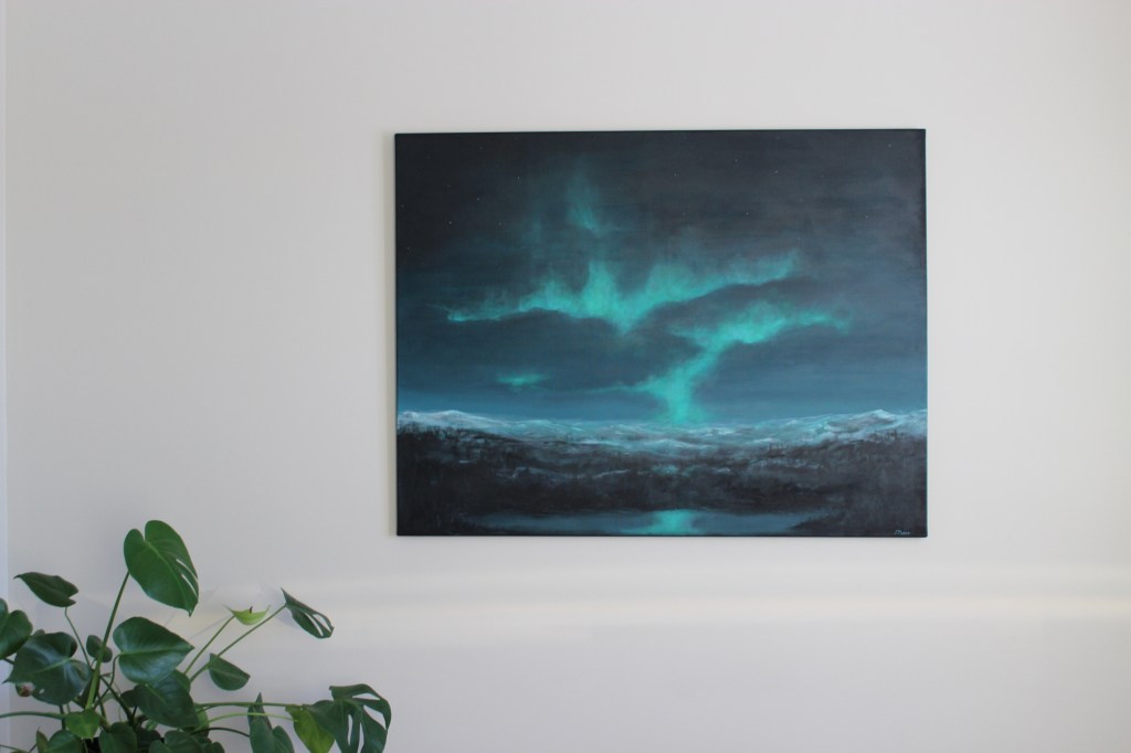 Kuva maalauksesta, jossa on revontulia.